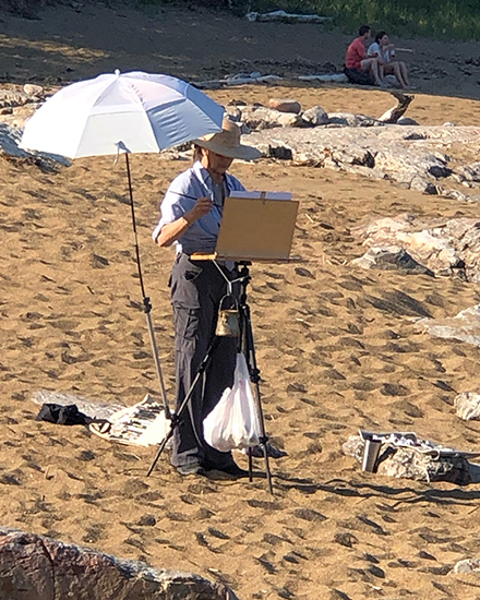 Photograph of Artist Stephanie Birdsall Painting en Plein Air