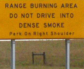 Range Burning Highway Sign