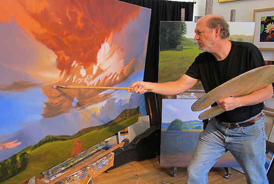 Photo of John Husey with Long Oil Painting Brush