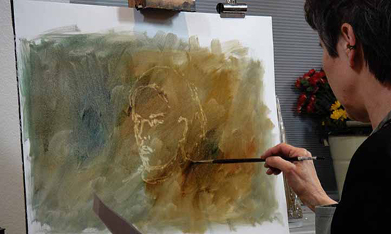 photo of Susan Blackwood painting a portrait © Susan Blackwood